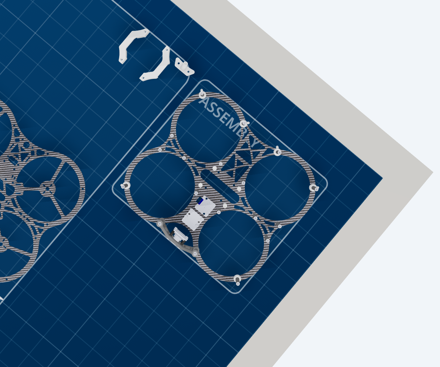 The bottom plate with the small white sensor board, LiDAR mount and forward camera now fitted between the rotor rings